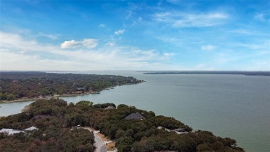Enjoy lakefront living at its finest with this stunning 1 - Lake Lot For Sale in Oak Point, Texas