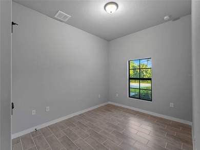 Tile throughout. Quartz countertops. Impact windows. Paver - photo 30