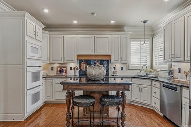 Experience golf course living at its finest in Ridgepointe! - photo 6