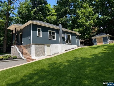Welcome to this beautifully renovated ranch, nestled in a - photo 1