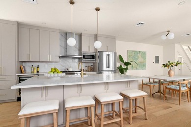 Perfectly positioned on a 106-foot-deep lot in the heart of - photo 1