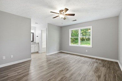 Quaint country living with this remodeled 4BR 2BA home sitting - photo 11