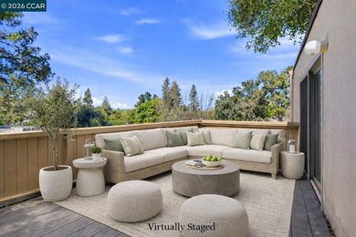 Stylishly updated end-unit condo with a large private deck &