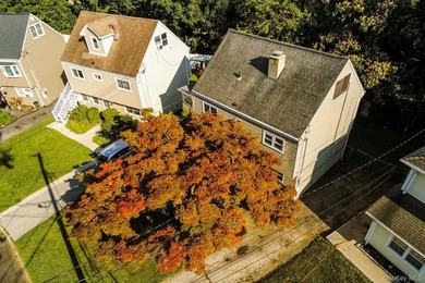 Legal two-family Colonial tucked away on large cul-de-sac - photo 2