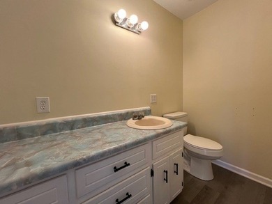 Big open water front home on Lake Sinclair! Located on the - photo 21