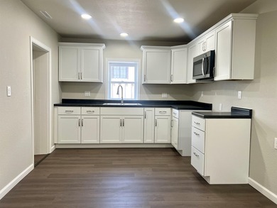 NEW is the word for this charming home! Built in 1948 and - photo 8