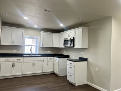 NEW is the word for this charming home! Built in 1948 and - photo 9