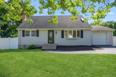 Welcome to this beautifully renovated 4-bedroom, 2-bath Cape - photo 1