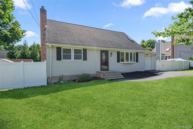 Welcome to this beautifully renovated 4-bedroom, 2-bath Cape - photo 2