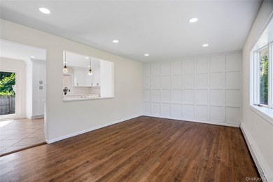 Welcome to this beautifully renovated 4-bedroom, 2-bath Cape - photo 4
