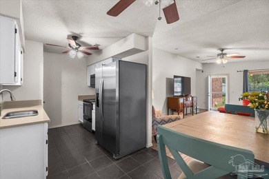 Located in Bay Pine Villas, this charming 3 bedroom, 2 bath home - photo 12