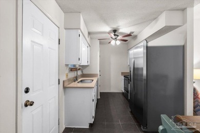 Located in Bay Pine Villas, this charming 3 bedroom, 2 bath home - photo 13