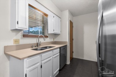 Located in Bay Pine Villas, this charming 3 bedroom, 2 bath home - photo 14