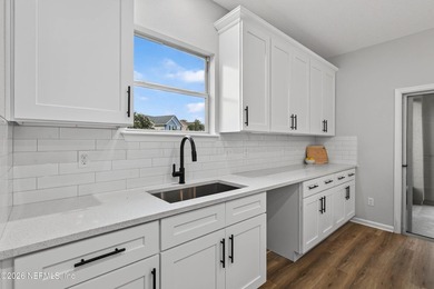 Welcome home to this beautifully renovated 3-bedroom, 2.5-bath - photo 22