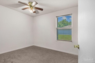 Located in Bay Pine Villas, this charming 3 bedroom, 2 bath home - photo 25