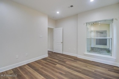 YOU WILL BE IN LOVE WITH THIS 4-BEDROOM DIAMONDHEAD HOME!!! - photo 15