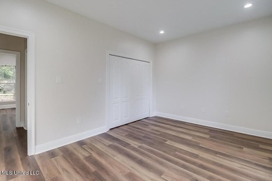 YOU WILL BE IN LOVE WITH THIS 4-BEDROOM DIAMONDHEAD HOME!!! - photo 19