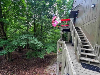 Unique End-Unit Floor Plan with Scenic Wooded Views of Lake - Lake Condo Sale Pending in Bloomington, Indiana