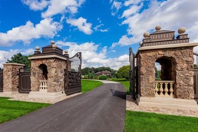 Beyond a private stone gate and winding drive lies an estate - photo 3