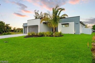 Experience modern luxury waterfront living in this stunning - photo 3