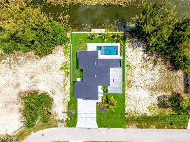 Experience modern luxury waterfront living in this stunning - photo 6