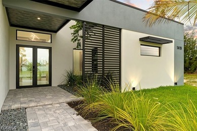Experience modern luxury waterfront living in this stunning - photo 8