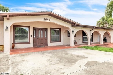 Situated on a spacious 0.65-acre corner lot surrounded by mature - photo 2