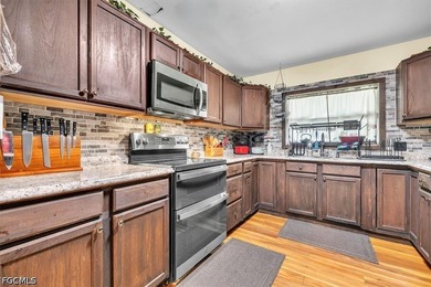 Situated on a spacious 0.65-acre corner lot surrounded by mature - photo 10