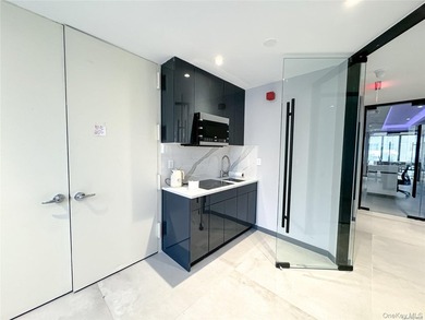 This newly renovated, floor-through office condominium in - photo 11