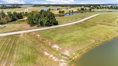 Affordable pond front homesite in the gated waterfront golf - photo 3