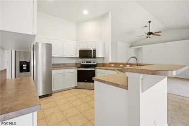 WELCOME HOME! Desirable 3/2/2 with DEN and lots of sliders to - photo 9