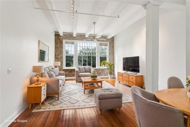 Live in the heart of New Orleans' vibrant Warehouse District