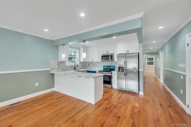 Introducing a stunning 2026-built legal two-family home situated - photo 14