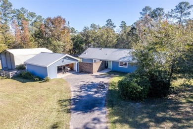 Lake Home For Sale in Waldo, Florida