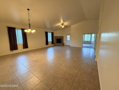 Spacious three bedroom, two bath home with cozy fireplace in