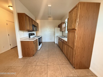 Spacious three bedroom, two bath home with cozy fireplace in