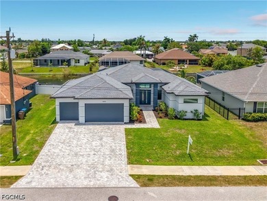 Welcome to 620 SW 26th Street, Cape Coral! This stunning - photo 1