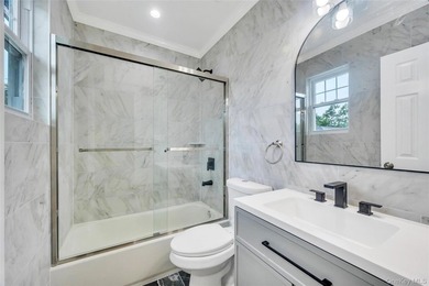 Introducing a stunning 2026-built legal two-family home situated - photo 42