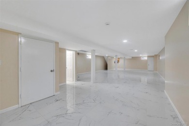 Introducing a stunning 2026-built legal two-family home situated - photo 46
