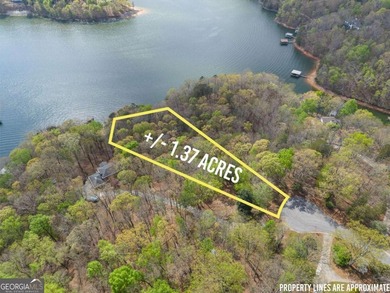 Beautiful 1.37-acre lakefront lot in the sought-after - photo 1