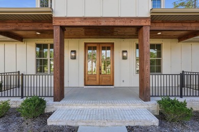 This 4 bed, 3.5 bath home sits on a flat 0.5 acre lot with 115' - photo 3