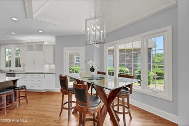 Nestled on a peaceful pond in the gated community of Landfall - photo 15