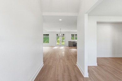 This 4 bed, 3.5 bath home sits on a flat 0.5 acre lot with 115' - photo 6