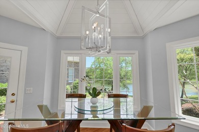 Nestled on a peaceful pond in the gated community of Landfall - photo 16