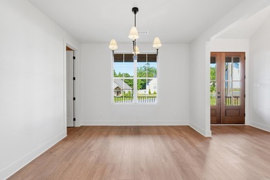 This 4 bed, 3.5 bath home sits on a flat 0.5 acre lot with 115' - photo 8