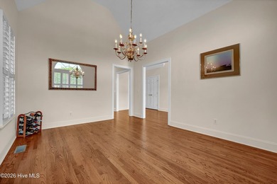 Nestled on a peaceful pond in the gated community of Landfall - photo 24
