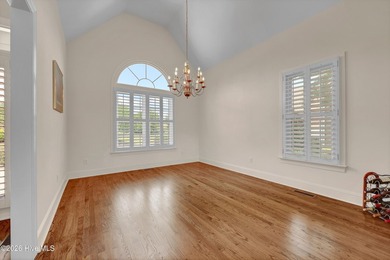 Nestled on a peaceful pond in the gated community of Landfall - photo 25