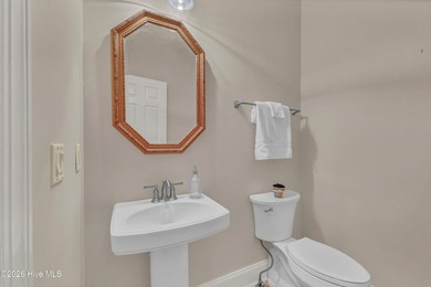 Nestled on a peaceful pond in the gated community of Landfall - photo 28