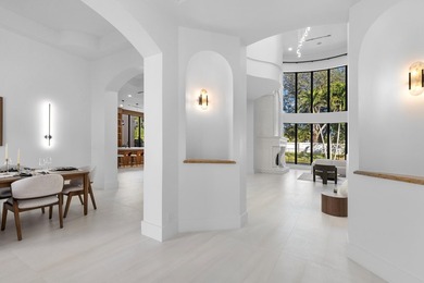 This classic Mediterranean estate in The Oaks has been - photo 10