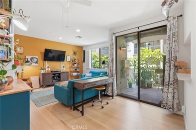 Bright and inviting, this two-bedroom, two-bath condo at the - photo 2